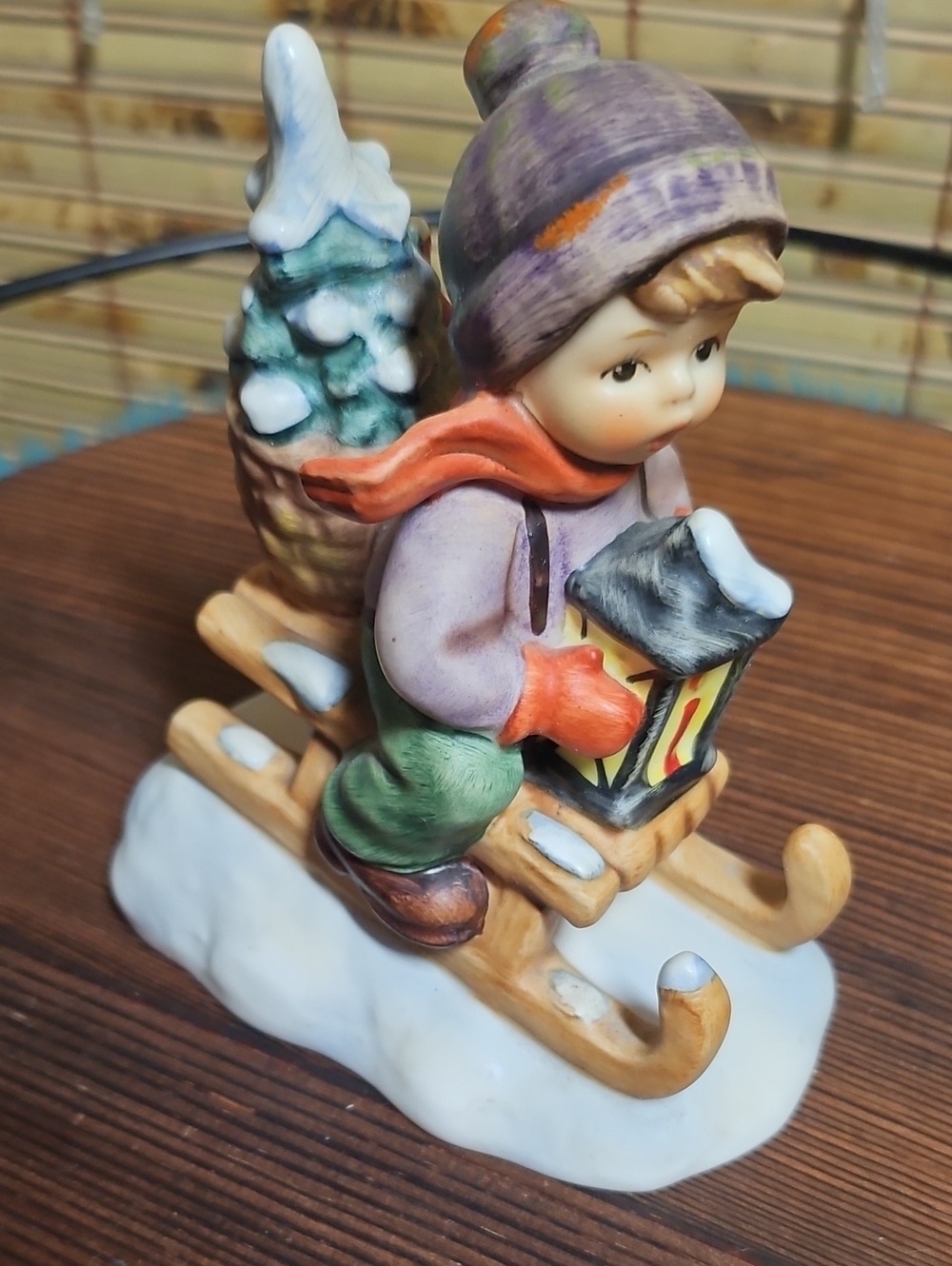 Hummel Ride Into Christmas Child Figurine on Sled with Lantern - Multicolor